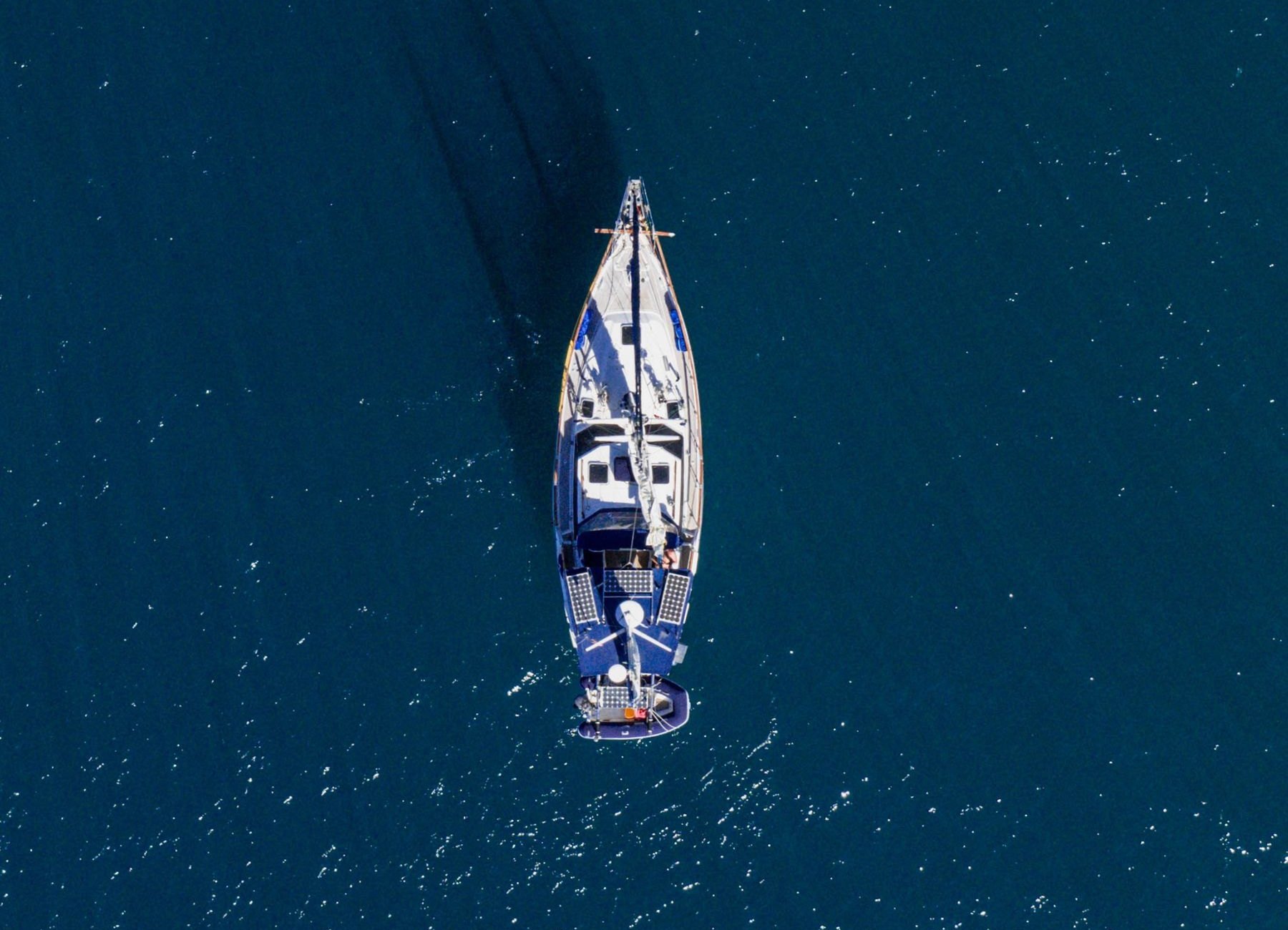 A sailing yacht under way, seen from directly above